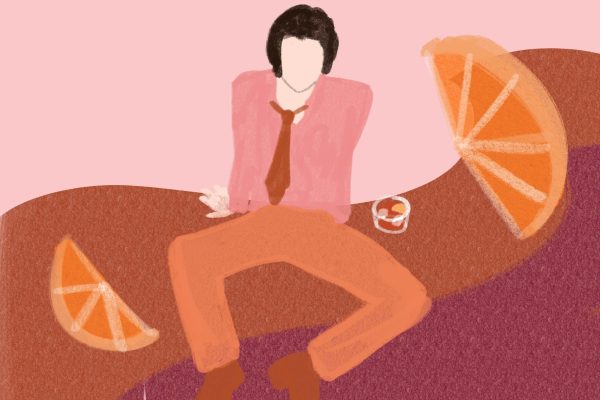 A person with short dark hair sitting on the ground wearing a pink shirt with a wide orange tie, orange pants and dark orange boots. Next to them is a glass with dark orange liquid and ice cubes while large orange slices decorate the corners of the illustration.