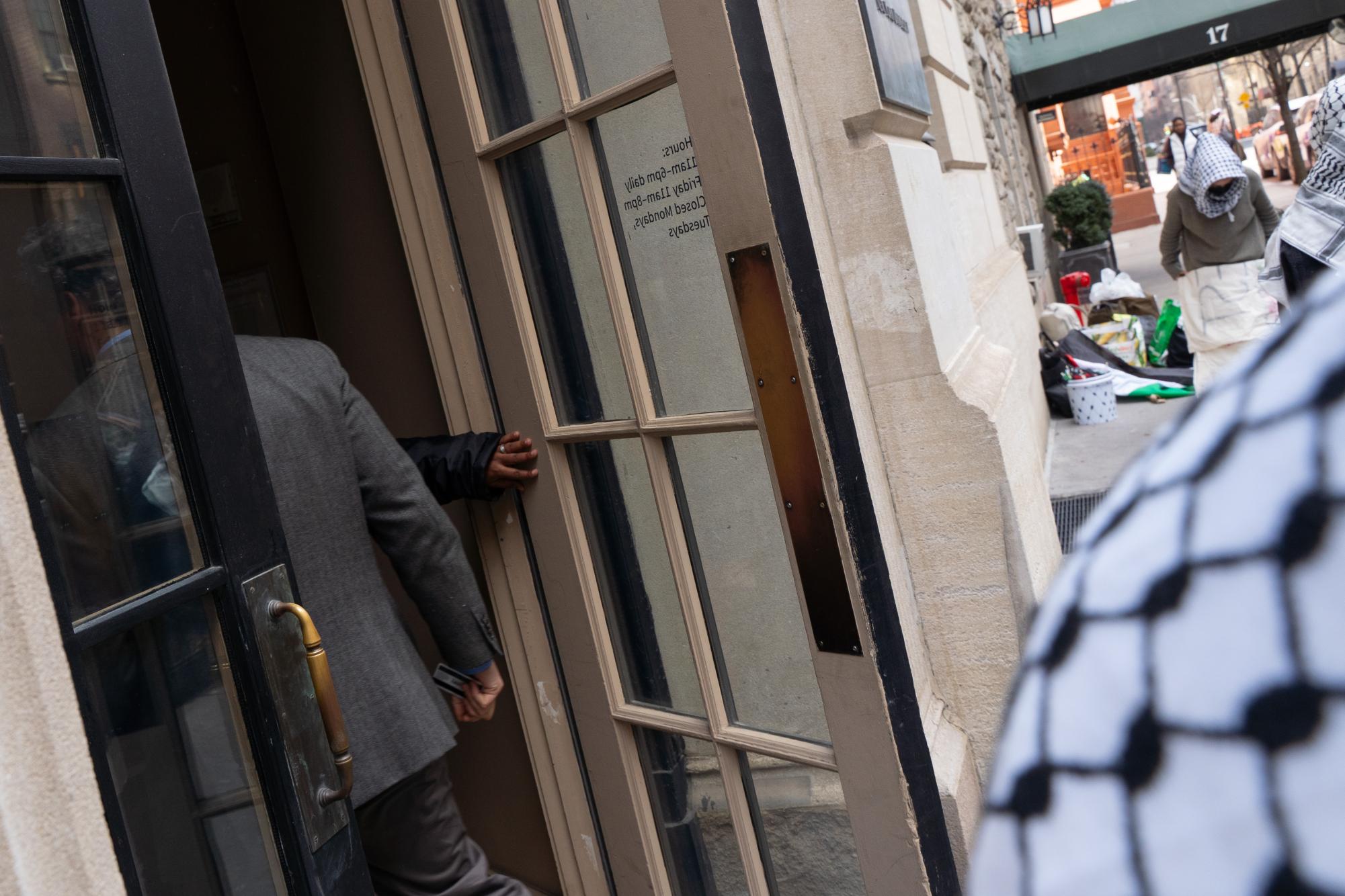 Students protest NYU investments outside trustees’ finance meeting