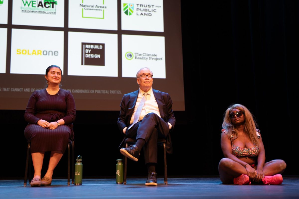 Agitator joins mayoral candidates Scott Stringer and Jessica Ramos onstage. (Alex Woodworth for WSN)