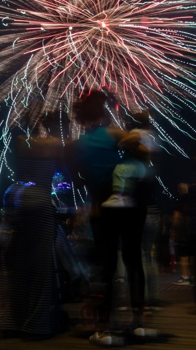 IMG_0389-4 A family enjoying a warm August evening beneath fireworks at Coney Island. (Krish Dev for WSN)