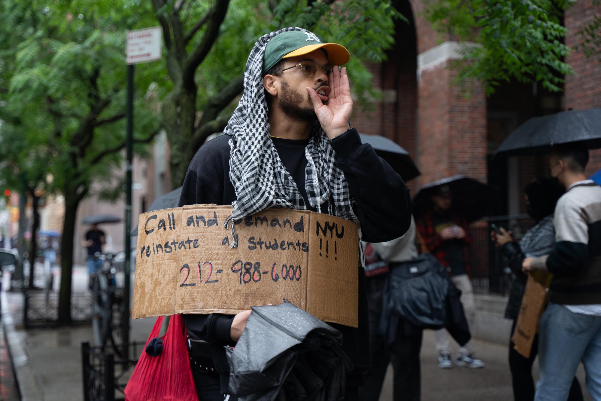 Students picket outside Vanderbilt Hall, demand NYU Law cut anti-protest contract