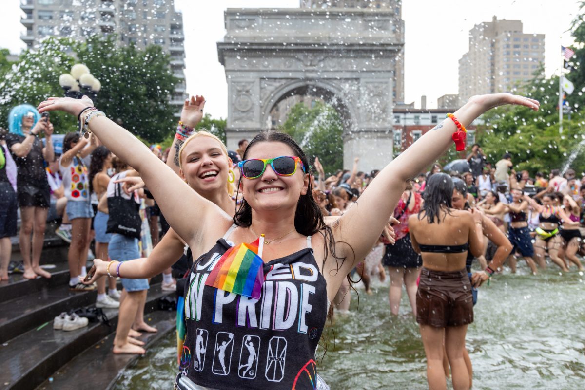 People celebrate Pride Month in Washington Square Park, June 30, 2024, in New York. (Danny Arensberg for WSN)