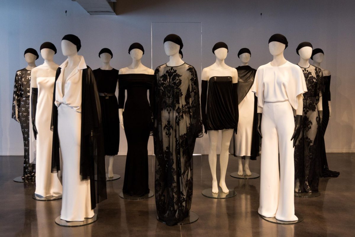 Mannequins wearing a variety of black and white pieces by Norma Kamali. (Ivy Chan for WSN)