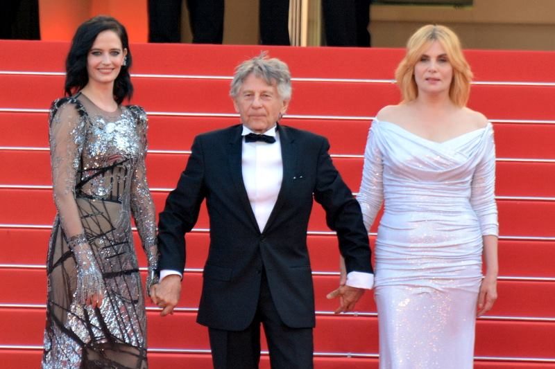 Director Roman Polanski with actresses Emmanuelle Seigner and Eva Green at the 2017 Cannes Film Festival. (Courtesy of Wikimedia Commons)