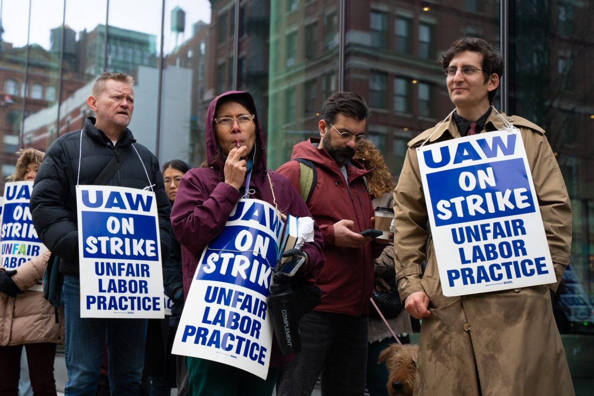 Professor David Siffert (right) at contract faculty's picket outside the Paulson Center. (Alex Woodworth for WSN)