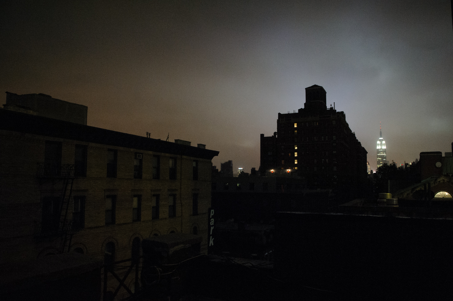Widespread power outages have turned the city dark